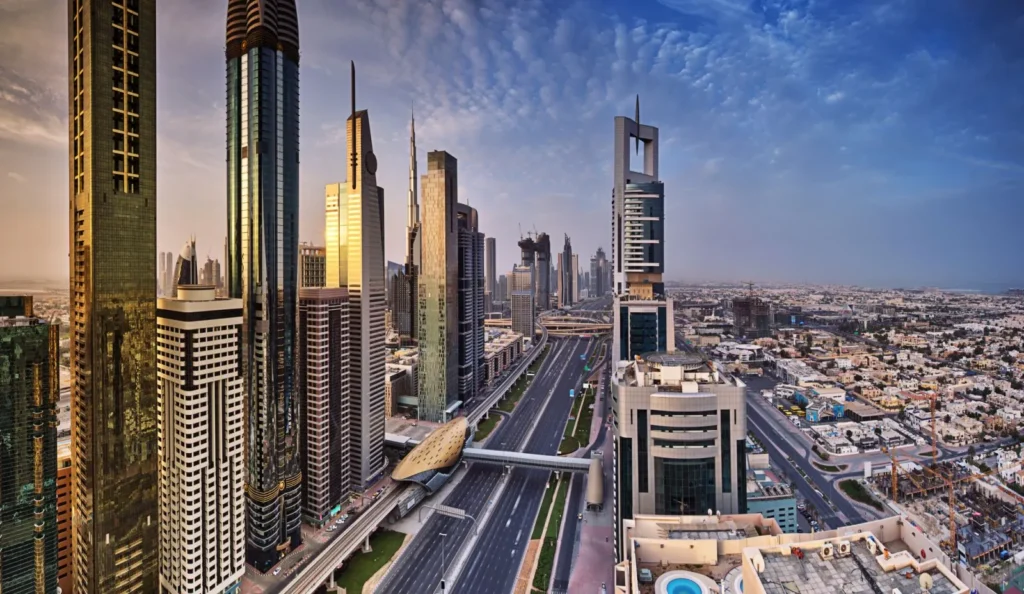 Sheikh Zayed Road skyline with skyscrapers and metro line in Dubai’s financial district.