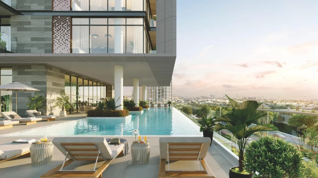 Luxury residential terrace pool in Dubai with skyline and sunset views.